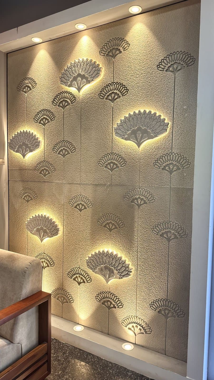 Backlit CNC-carved stone feature wall