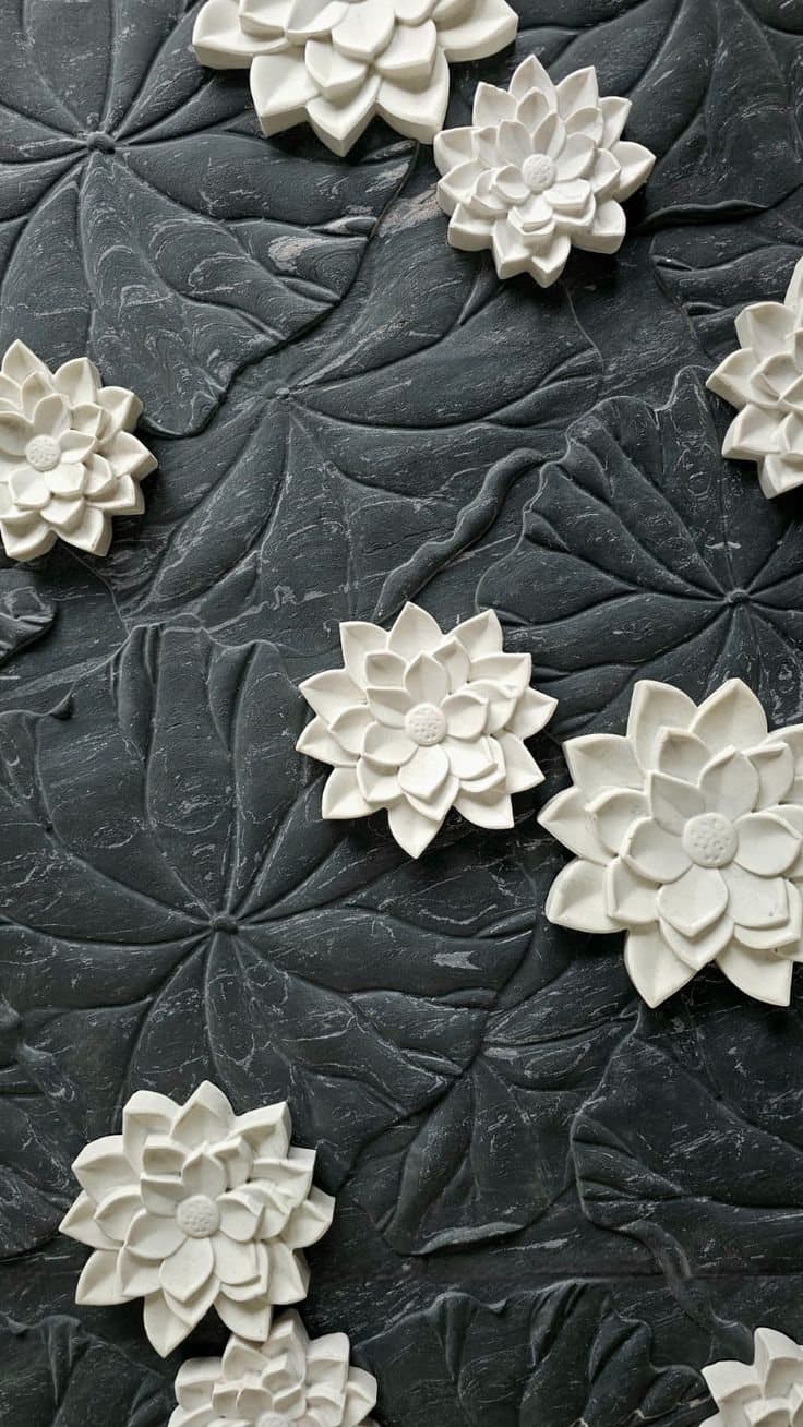 Lotus stone art carved on dark stone