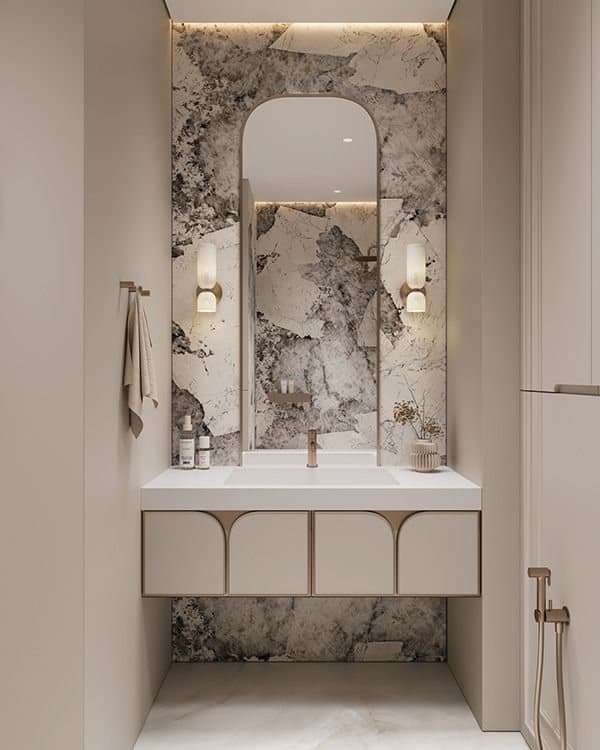 Marble-backed vanity with sculpted basin
